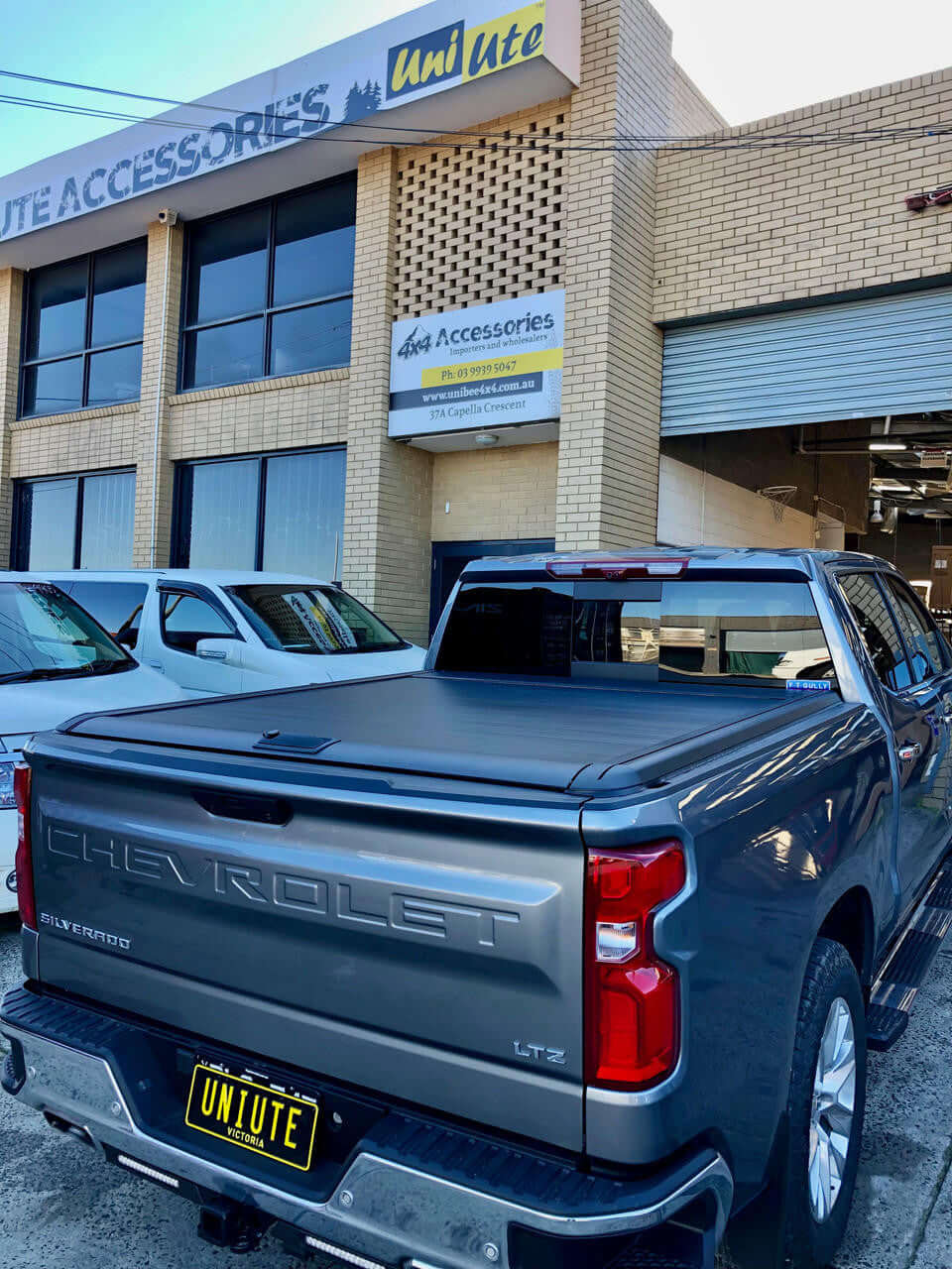 Silverado 1500 EGen2 roller shutter — rear three-quarter view installed