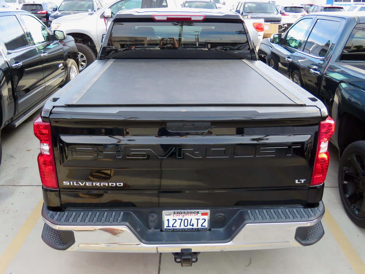 REVOLVER tonneau on Chevrolet Silverado 1500 — partially open showing tub access