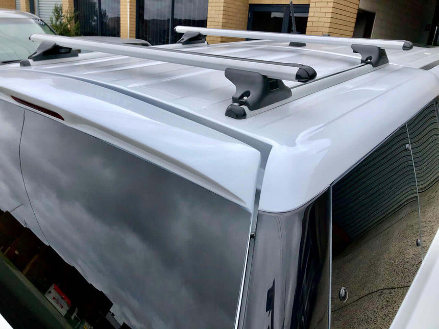 canopy roof bars installed on a white vehicle for Elysium and Force Pro canopies, showcasing strength and style.