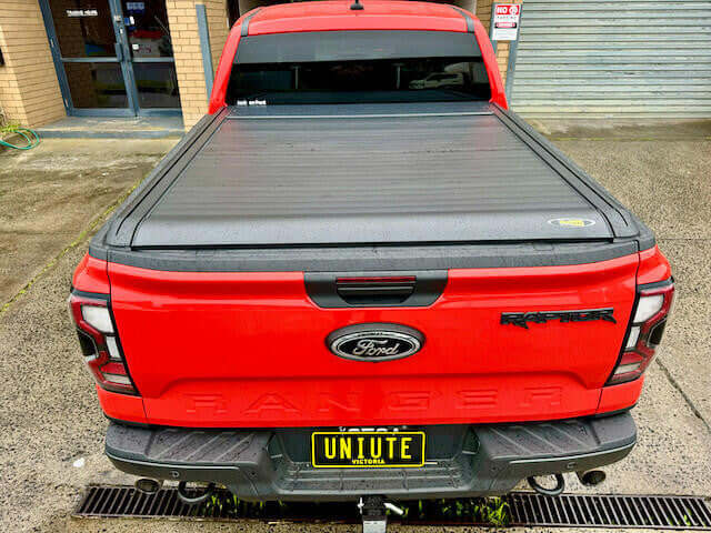 Ford Ranger Roller Shutter NextGen 2022+ with UniUte EGen2 Electric Black Roller Lid in parking lot
