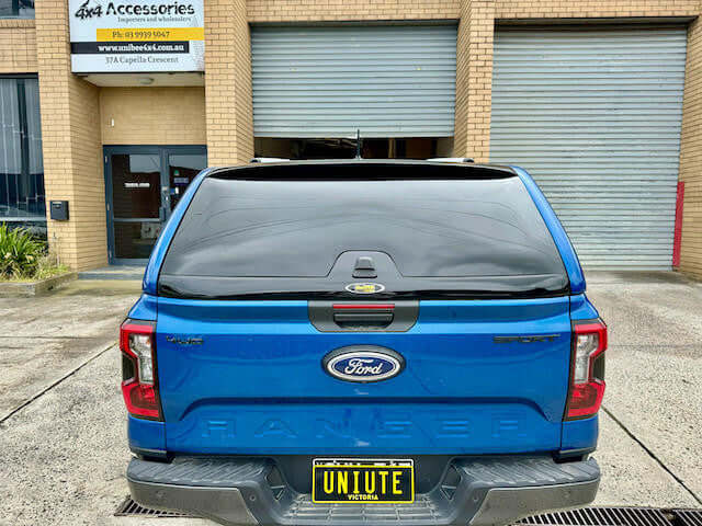 Ford Ranger Canopy FORCE PRO RA 2022-2025 on a blue truck rear view