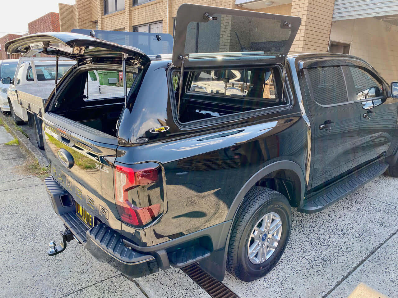 Ford Ranger canopy for RA NextGen 2022-2025, showcasing premium protection and style for work and adventure.