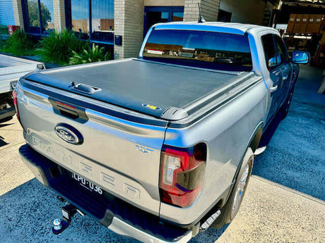 Ford Ranger with UniUte Next Gen ranger roller shutter in a driveway