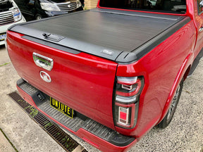 Red ute with UniUte EGen2 Electric Black Roller Shutter for GWM Cannon Roller Cover 2020-2025