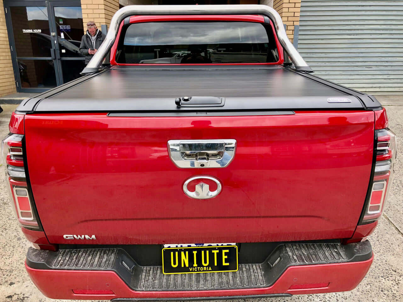 GWM Cannon Roller Cover on red ute with closed UniUte EGen2 Electric Black Roller Shutter, 2020-2025 model.