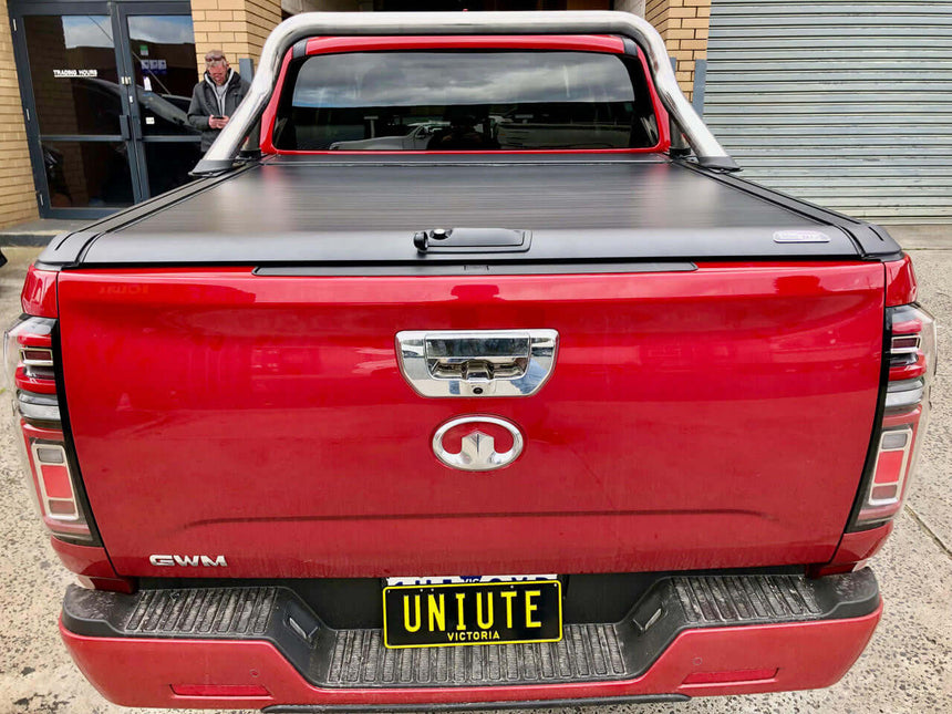 GWM Cannon Roller Cover on red ute with closed UniUte EGen2 Electric Black Roller Shutter, 2020-2025 model.