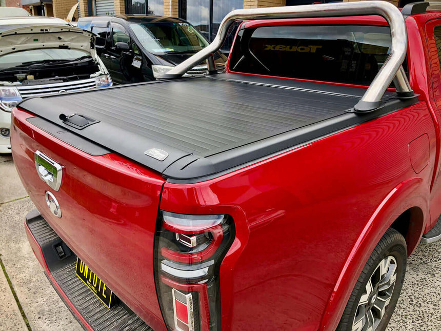 Red ute equipped with a GWM Cannon Roller Cover, showcasing the UniUte EGen2 Electric Black Roller Shutter for GWM CANNON 2020-2025.