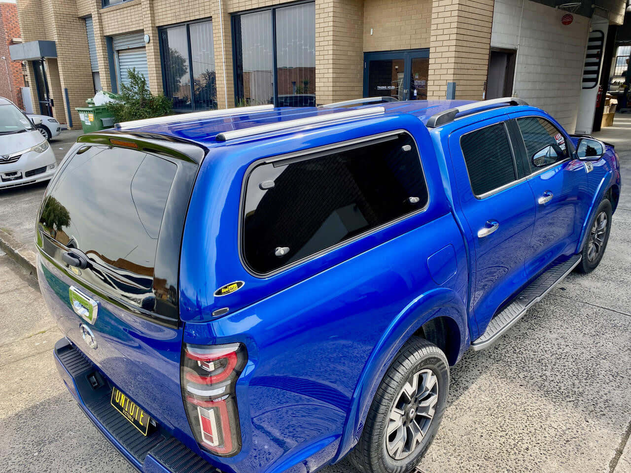Blue GWM Cannon Canopy, 2020-2025 model, on a city street.