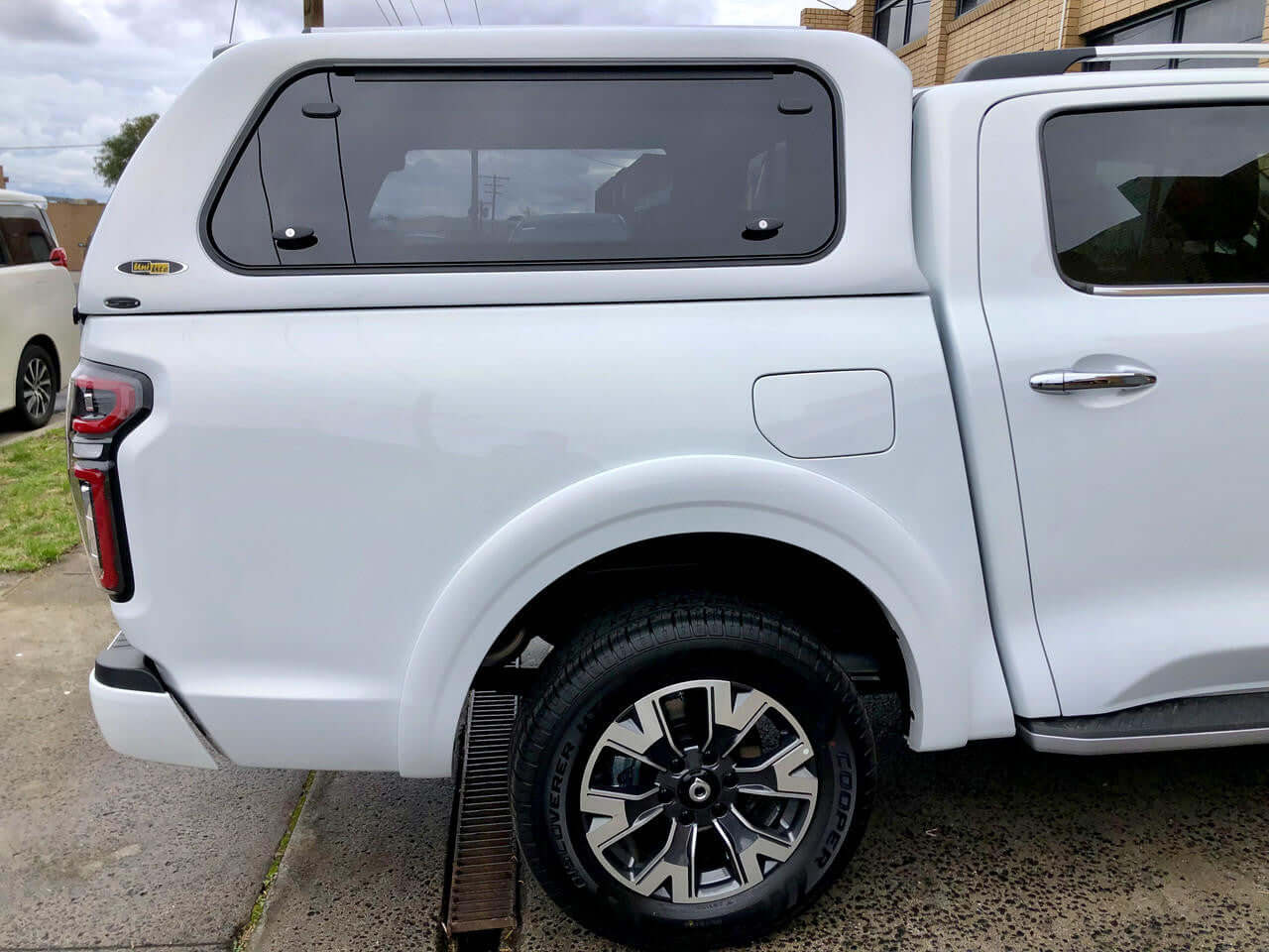 Side view of GWM Cannon canopy installed, showcasing sleek design and functionality.