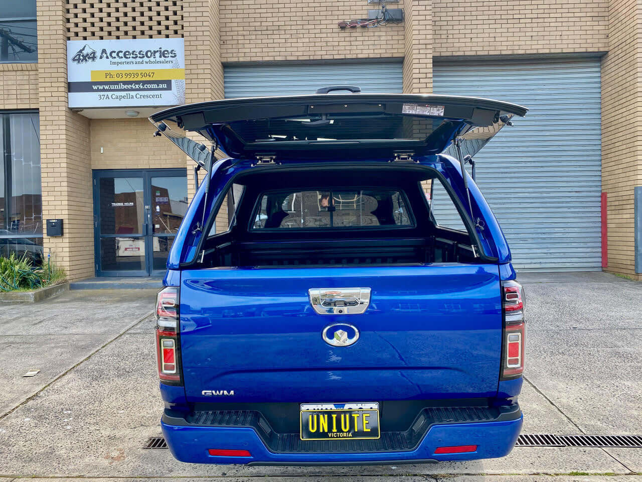 Blue GWM Cannon Canopy in parking lot 2020-2025