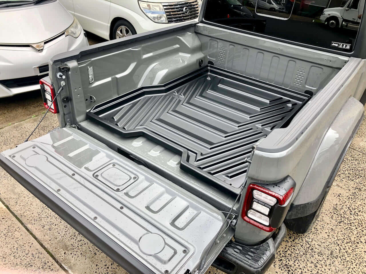 cargo tray in Jeep Gladiator 2020-2025 with sliding tray drawer for enhanced vehicle storage