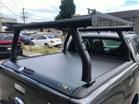 Ladder racks for Gen1 & Gen2 roller shutters on a ute, ideal for carrying ladders and long items securely.