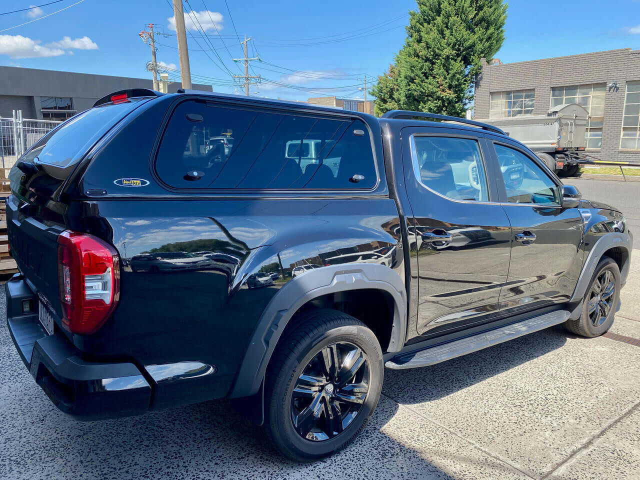 Black LDV T60 canopy 2017-2025 by UniUte FORCE PRO parked outdoors, showcasing premium design and durability for ultimate protection and style.