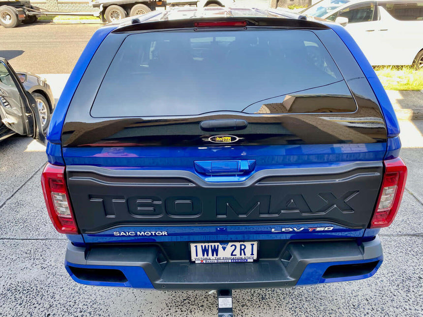 Blue LDV T60 canopy parked in driveway, rear view showcasing ultimate protection and style