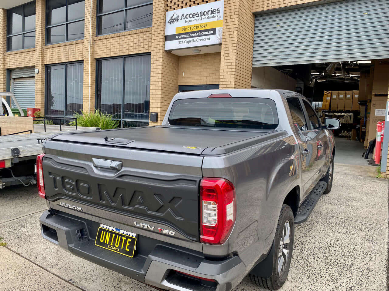 LDV T60 with UniUte Gen2 Manual Roller Shutter, showcasing the ldv t60 roller shutter in use at a garage.
