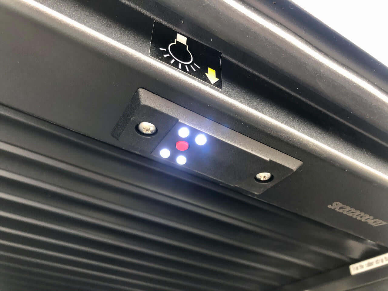 Electric control panel of Mazda BT50 Roller Shutter EGen2 showcasing LED lights for enhanced security and style, 2021-2025 model.