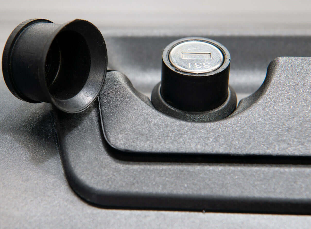 Close-up of BT50 roller shutter lock mechanism for Mazda 2021-2025 showing lock detail on UniUte Gen2 Manual Roller Cover.