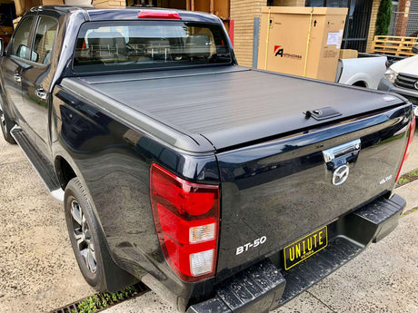 Mazda BT-50 with UniUte Gen2 Manual bt50 roller shutter for 2021 model, showcasing durability and style in black finish.