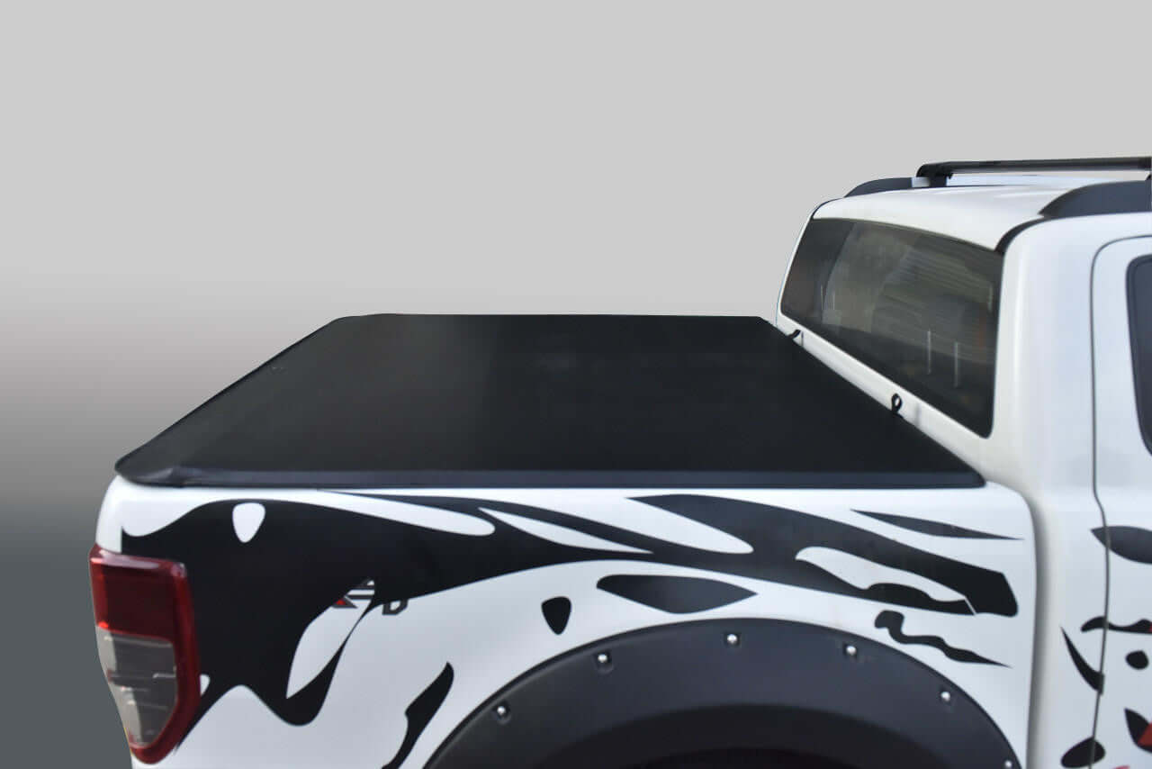 Mazda BT50 tonneau cover 2020-2025 Soft Roll Up, black cover on white truck bed, enhancing style and functionality for BT-50 vehicles.