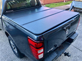 Tri-fold hard lid for Mazda BT-50 2020-2026 — installed closed position | UniUte