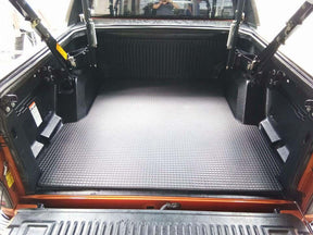 Tub mat for Mazda BT-50 2020-2026 — custom-fit heavy-duty rubber installed | UniUte