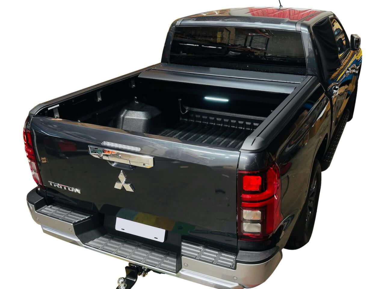 Triton Roller Cover on Mitsubishi Triton MV 2024 with EGen2 Electric Roller Shutter open, showcasing innovative design.