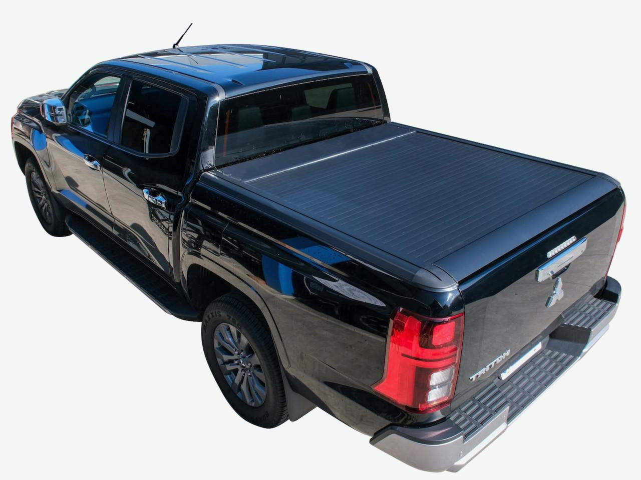 triton roller cover Mitsubishi MV 2024+ EGen2 electric roller shutter on a truck bed.