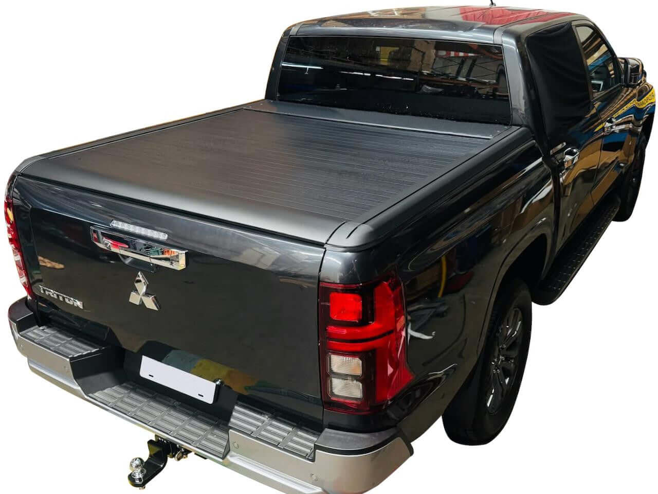 Mitsubishi Triton MV 2024+ with UniUte EGen2 triton roller cover electric roller shutter installed, showcasing modern design and functionality.