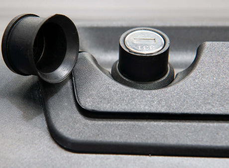Close-up of Triton roller shutter lock mechanism on Mitsubishi Triton MQ & MR 2015-2024 Gen2 manual cover.