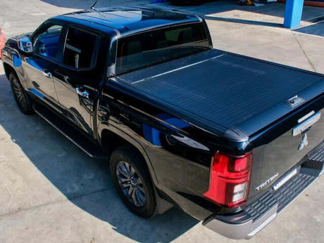 Mitsubishi Triton Roller Shutter MV 2024+ Gen2 Manual on a black truck, enhancing cargo security and style.