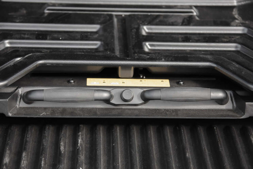 Close-up of a slide tray for ute, designed for Mitsubishi Triton 2009-2025, showing the durable handle and locking mechanism.