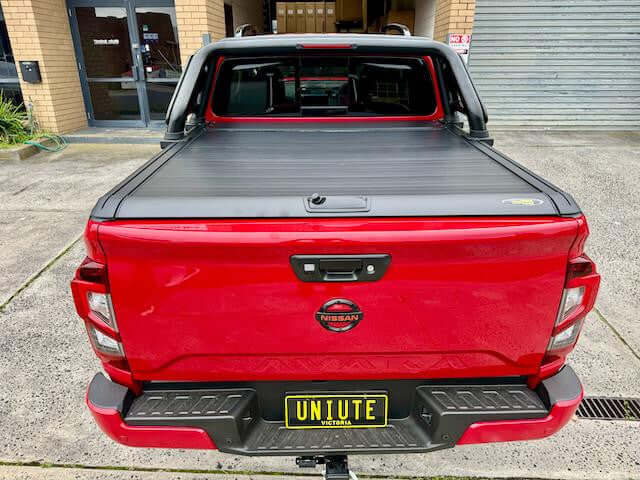 roller shutter for nissan navara NP300 Gen2 manual cover on red truck