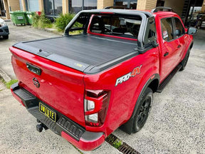 Manual roller shutter for Nissan Navara NP300 2015-2025 — installed on red ute | UniUte