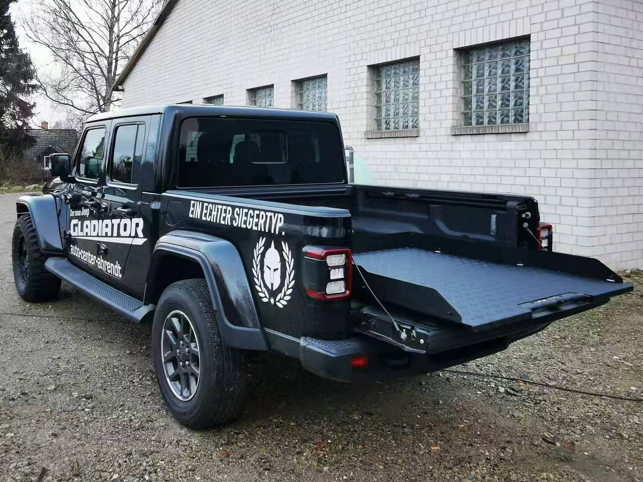 Jeep Gladiator 2020-2026 slide tray — loaded position showing weight capacity