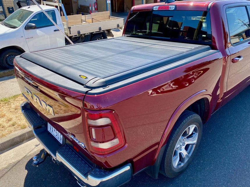 RAM 1500 with UniUte EGen2 Electric Black Roller Shutter, showcasing ram 1500 roller cover on a 5'7" bed for 2009-2025 models