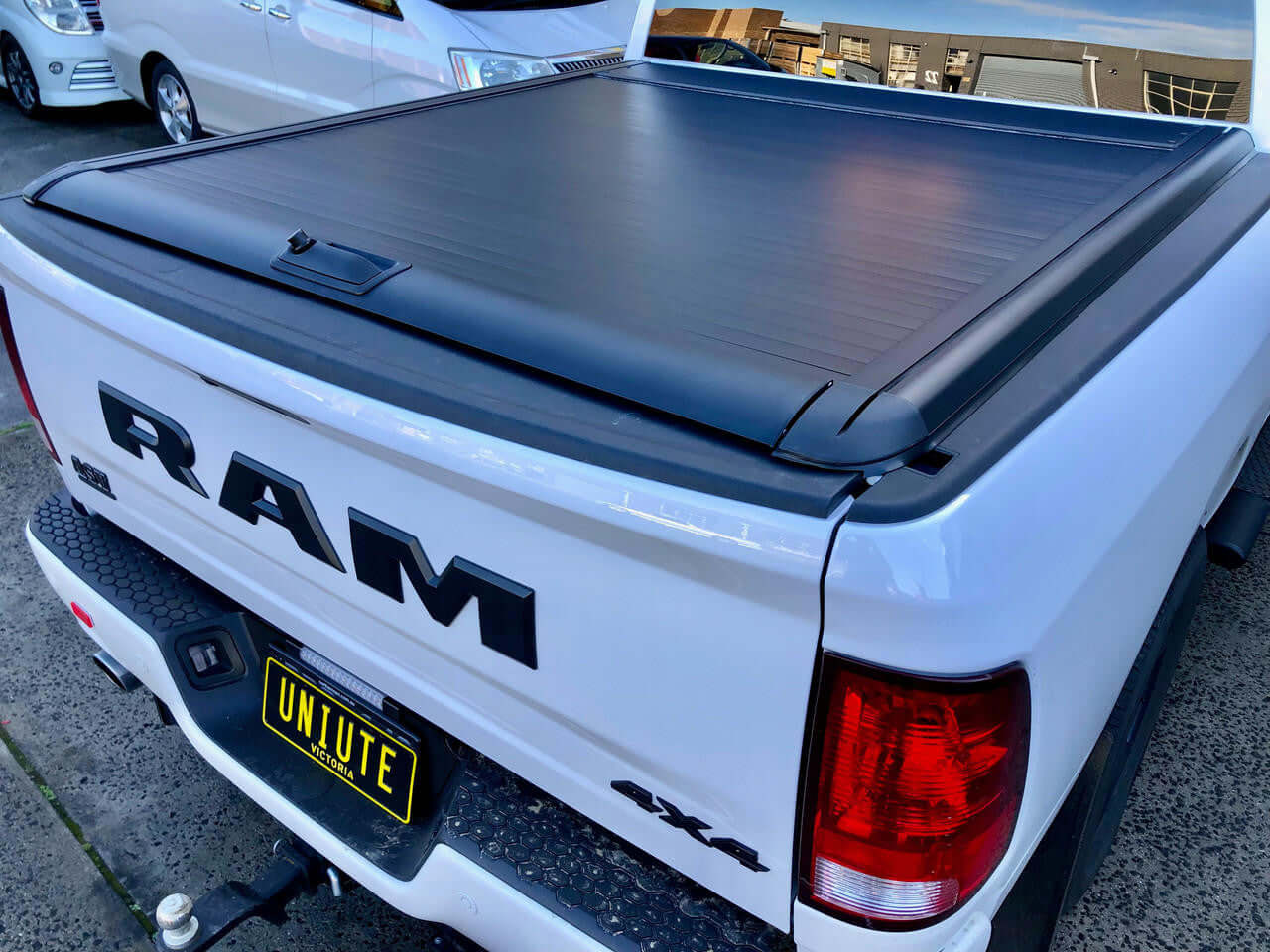 RAM 1500 roller shutter on a truck with a 5'7" bed, Gen2 manual cover, model years 2009-2025, showcasing a sleek and secure design.