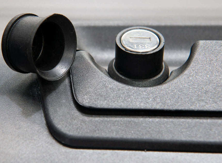Close-up of Gen2 Manual ram 1500 roller shutter lock mechanism on a 2009-2025 5.7' bed for RAM 1500 DS/DT trucks.