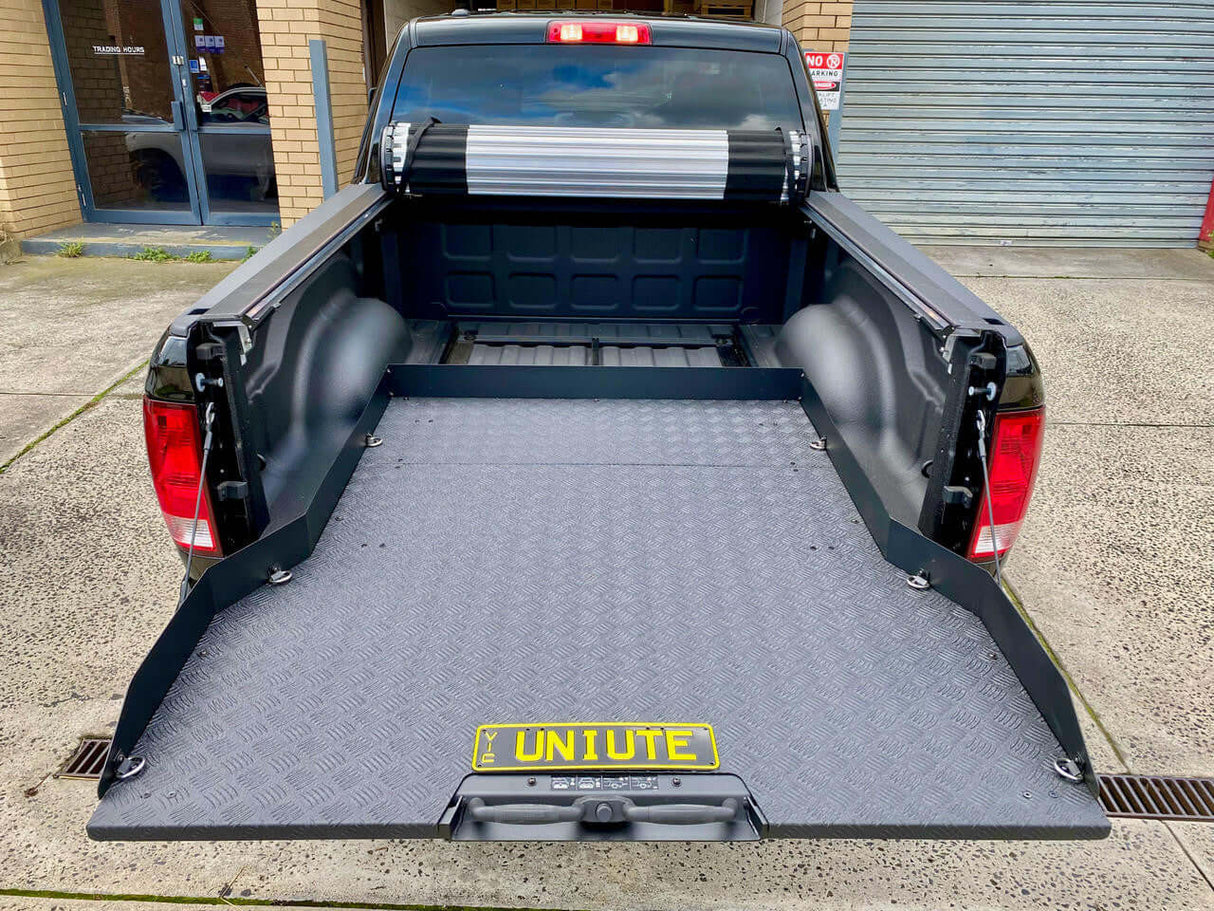 UniUte ute sliding tray installed in a RAM 1500 5'7" bed, providing convenient access and organization for truck cargo.