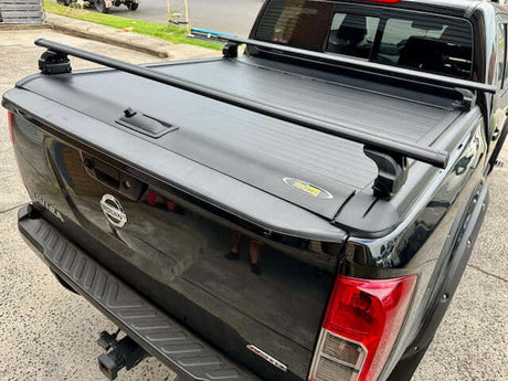 Roller shutter racks installed on black Gen2 roller lid, showcasing durable aircraft-grade alloy cross bars for optimal load support.