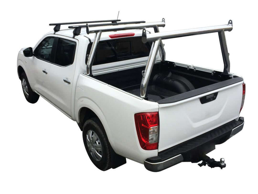 Set of 2 chrome ladders racks for utes on a white pickup truck, universal fit for transporting long items.