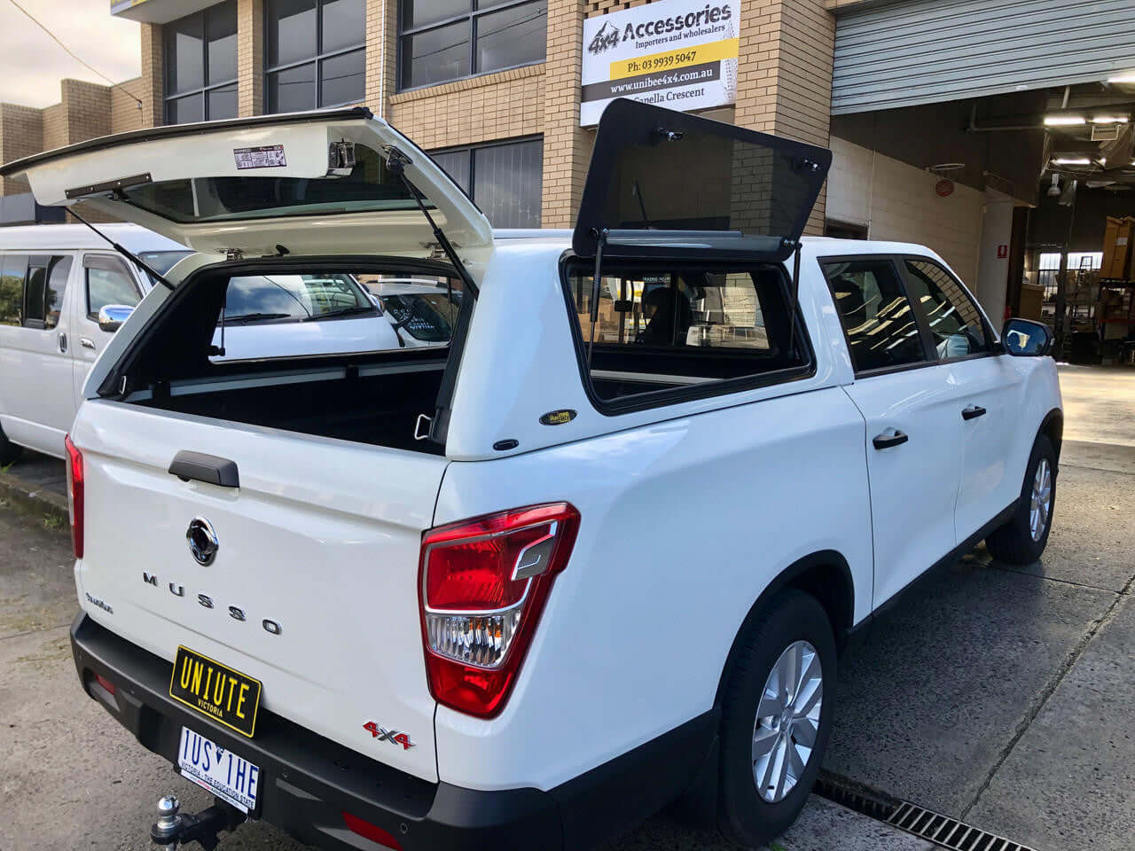 Canopy for SsangYong Musso XLV Long Tub 2018-2025 with open side and rear doors by UniUte, perfect for work and adventure.