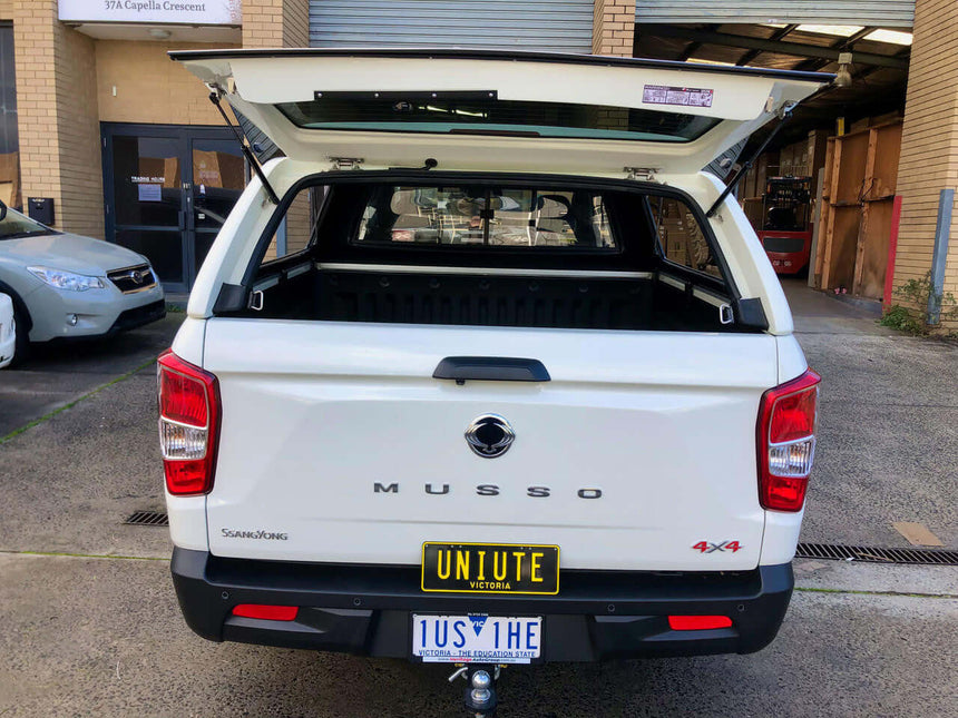 Open canopy for SsangYong Musso XLV 2018-2025 by UniUte, showcasing versatility and heavy-duty design for work and adventure.
