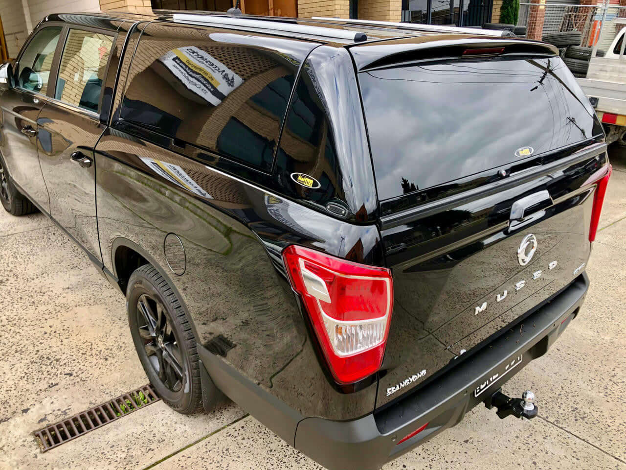 SsangYong Musso XLV Canopy FORCE PRO PLUS 2018-2025 on a parked pickup truck