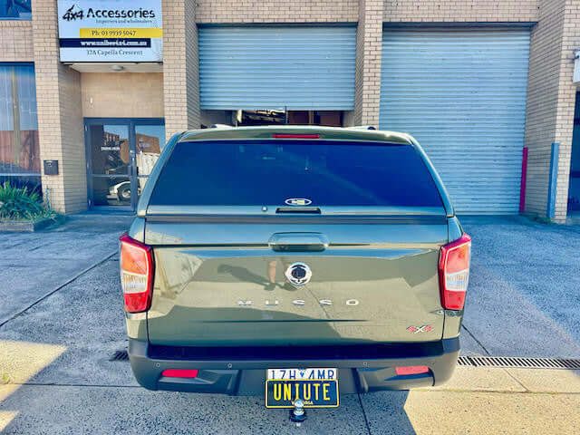 SsangYong Musso XLV Canopy - FORCE PRO PLUS 2018-2025 parked at an accessory shop