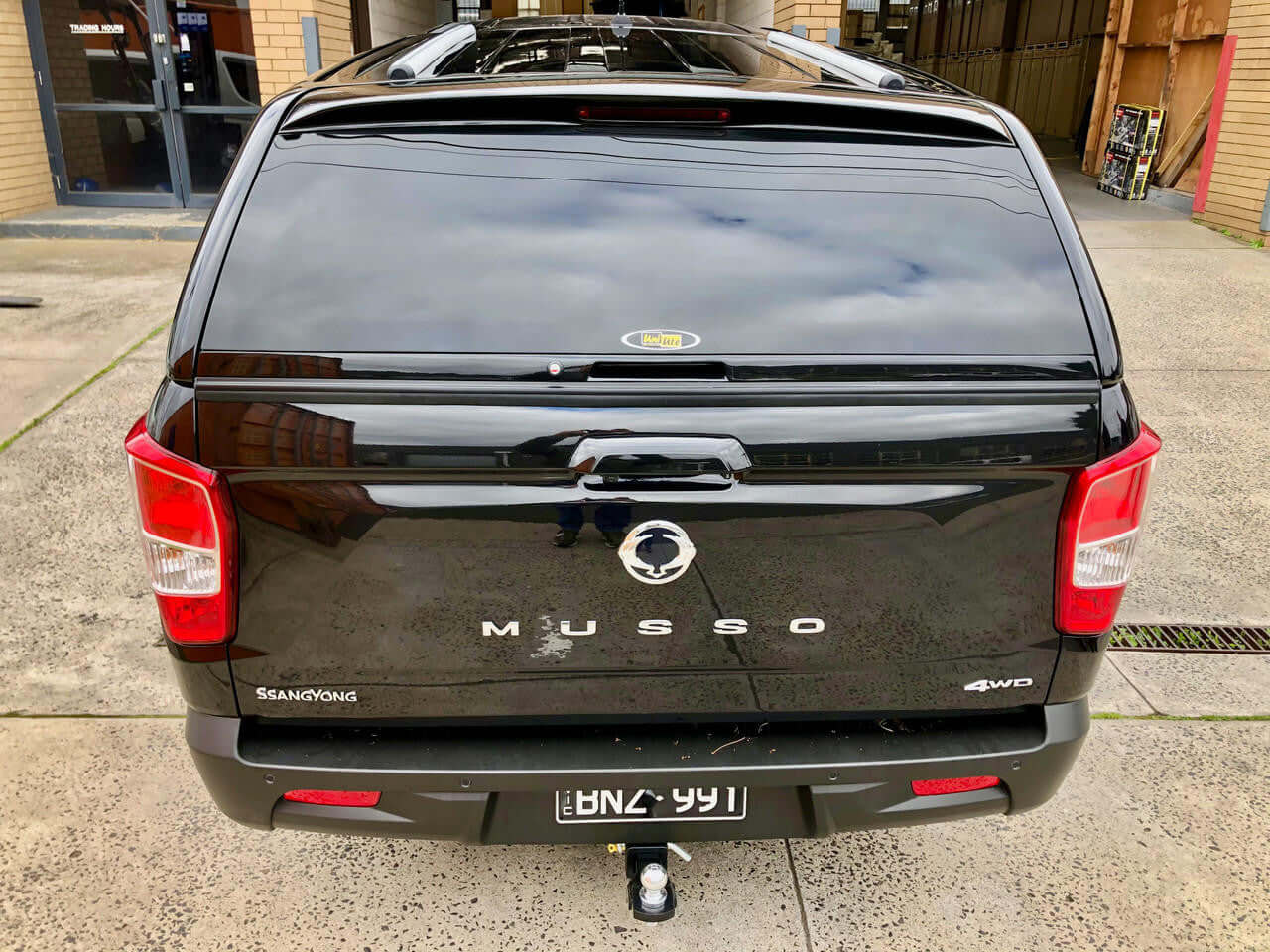 Rear view of SsangYong Musso XLV Canopy FORCE PRO PLUS 2018-2025 in black finish.