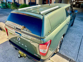 Fibreglass canopy for KGM Musso XLV long tub 2018-2026 — installed on green ute | UniUte