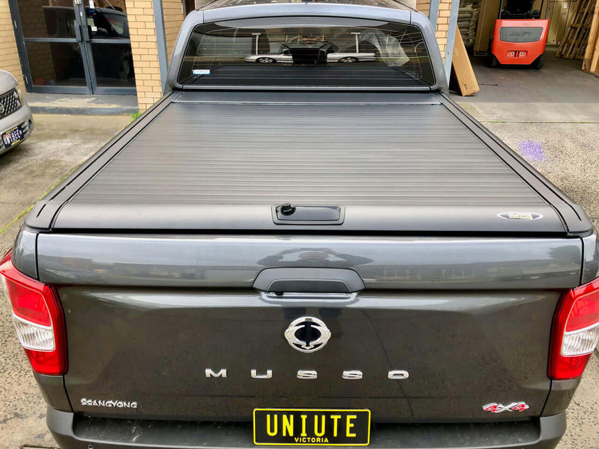 SsangYong Musso roller shutter on UniUte Gen2 for XLV Long Tub 2018-2025, showcasing durability and style for 4x4 enthusiasts.