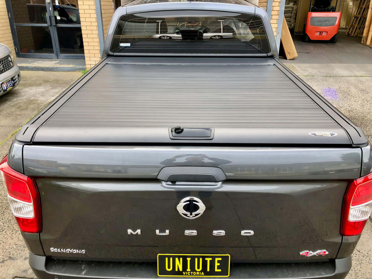 SsangYong Musso roller shutter on UniUte Gen2 for XLV Long Tub 2018-2025, showcasing durability and style for 4x4 enthusiasts.