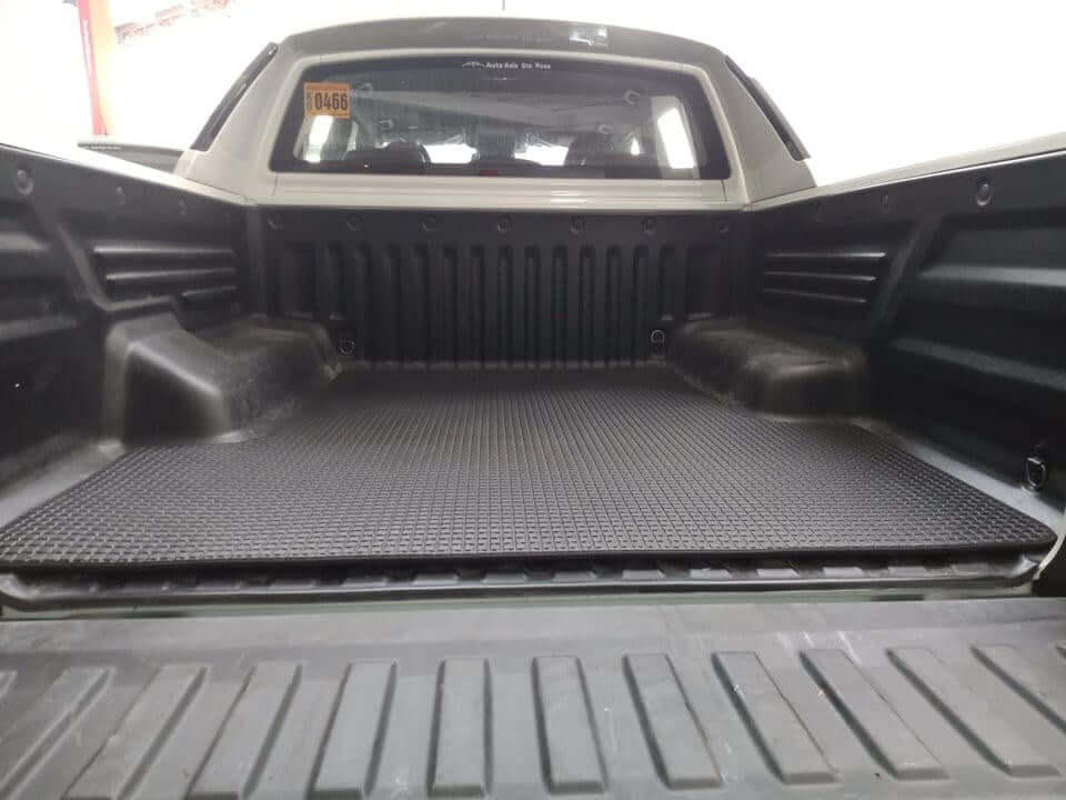SsangYong Musso XLV tub mat fitted — side profile showing full sidewall coverage