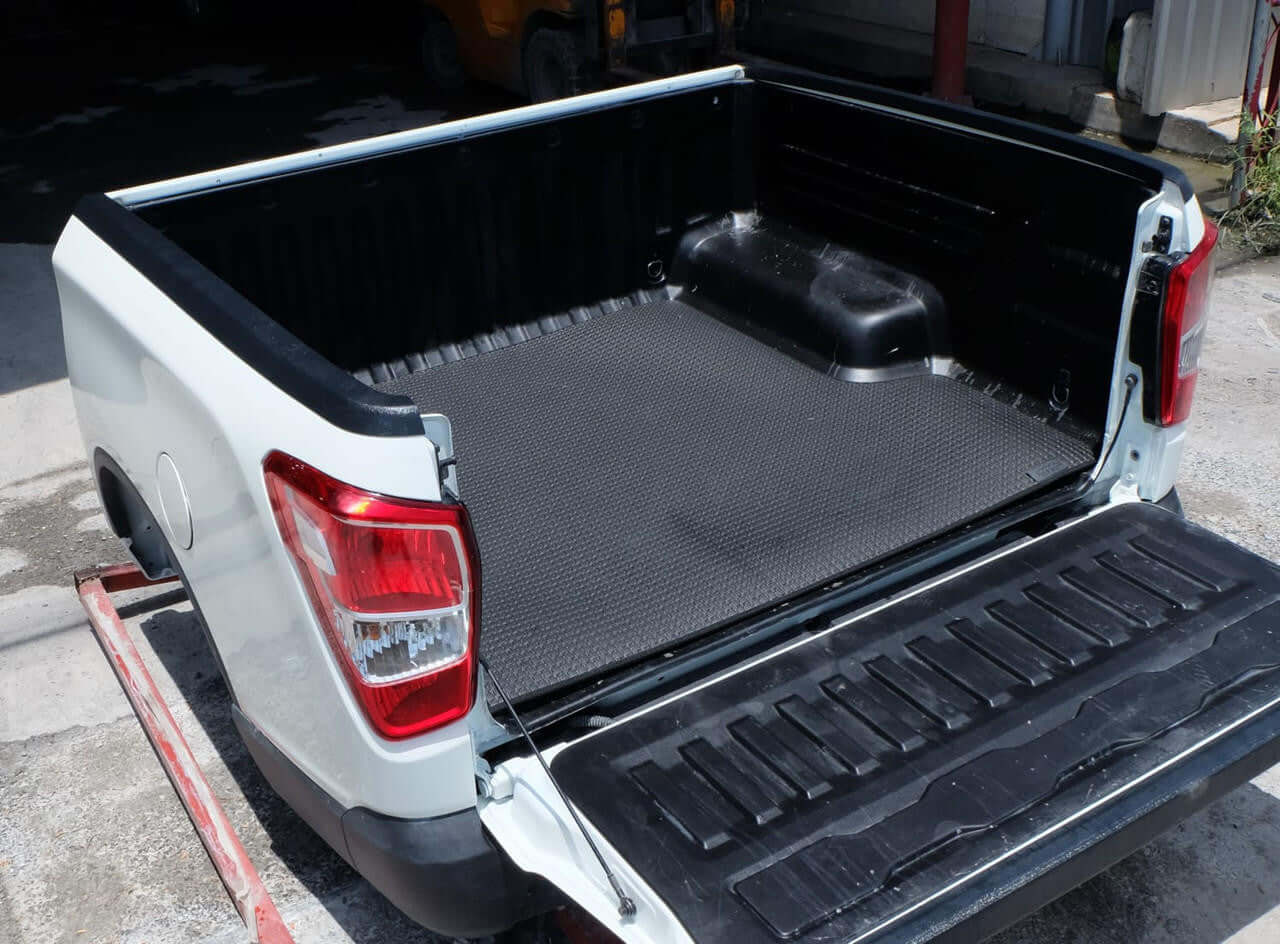 Tub mat for SsangYong Musso long tub XLV 2018-2026 — custom-fit heavy-duty rubber | UniUte